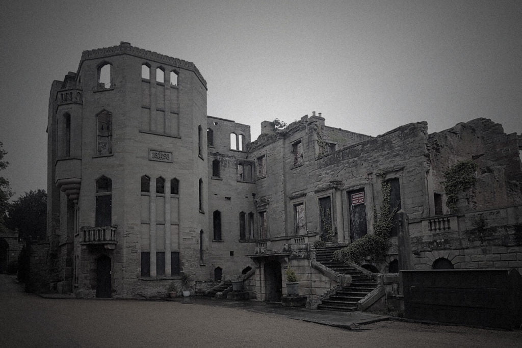 Blog 32 Whispers in the Shadows: Unearthing Warwick's 6 Most Haunted Sites. Guys Cliffe House exterior|Guys Cliffe House exterior|Guys Cliffe House exterior|Guys Cliffe House parapet|Guys Cliffe House stairs to courtyard|Guys Cliffe House exterior|Guys Cliffe House tunnel leading underground|Guys Cliffe House exterior