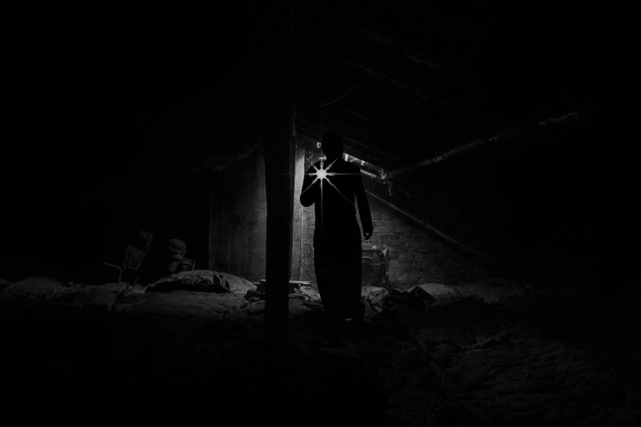 man_shining_light_hh