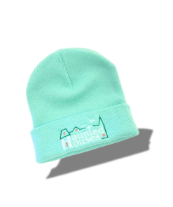 Gift Shop 11 mint green beanie with hunted houses logo on it